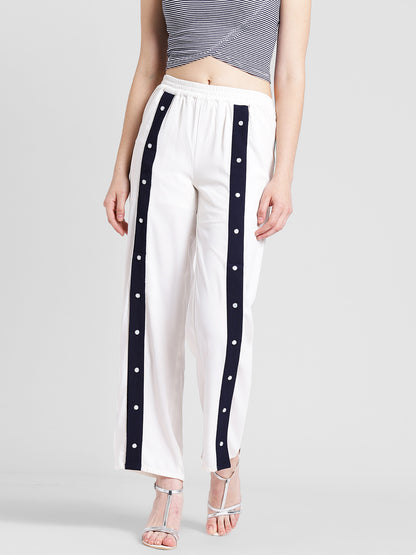 Women's White Track Style Pants with Navy Blue Side Button Detail – Casual Sporty Look