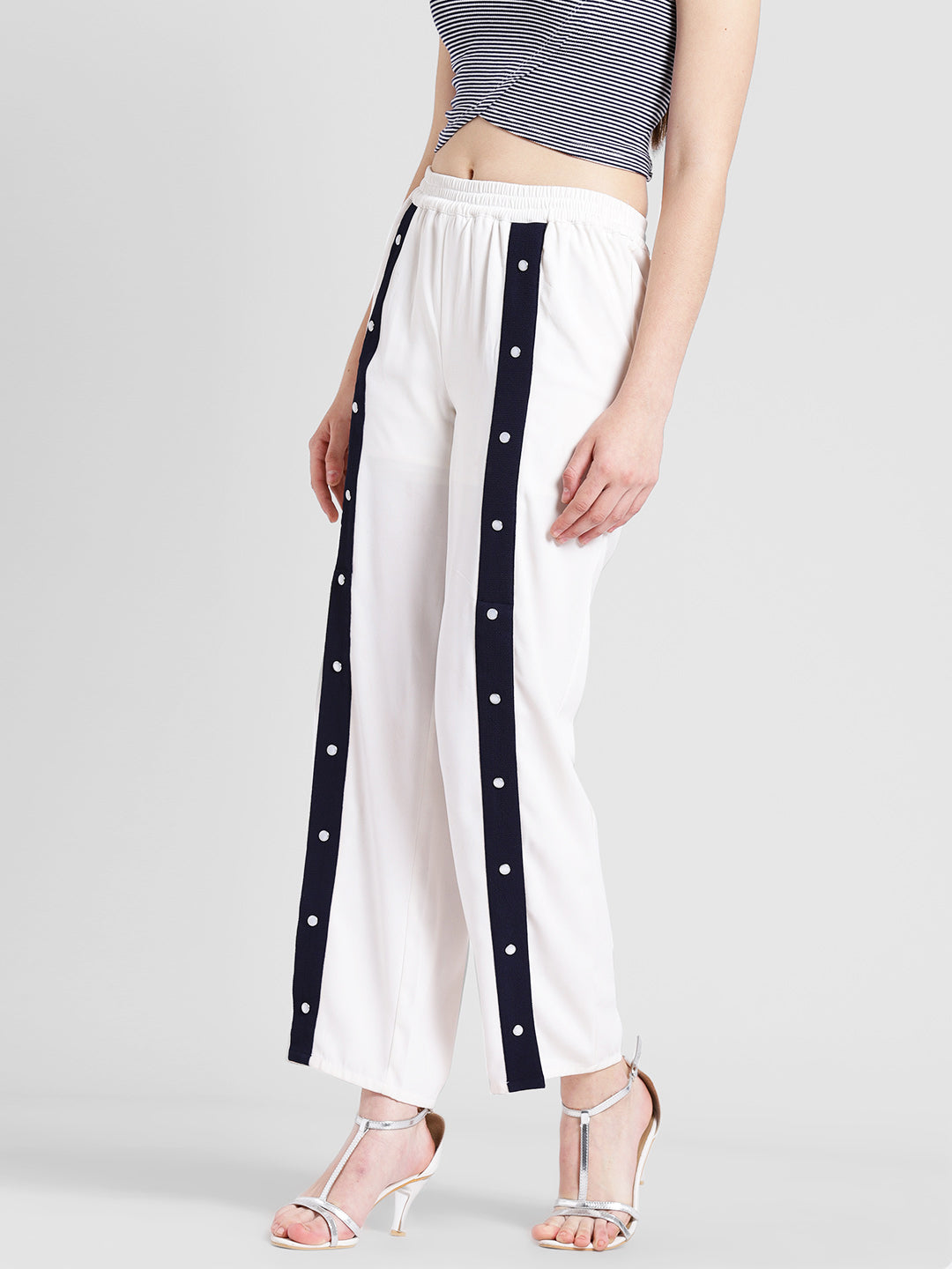 Women's White Track Style Pants with Navy Blue Side Button Detail – Casual Sporty Look