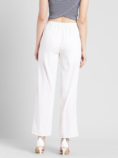 Women's White Track Style Pants with Navy Blue Side Button Detail – Casual Sporty Look