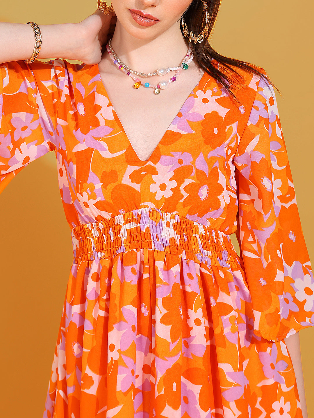Women's Orange Floral Print Maxi Dress with V-Neck and Flared Sleeves