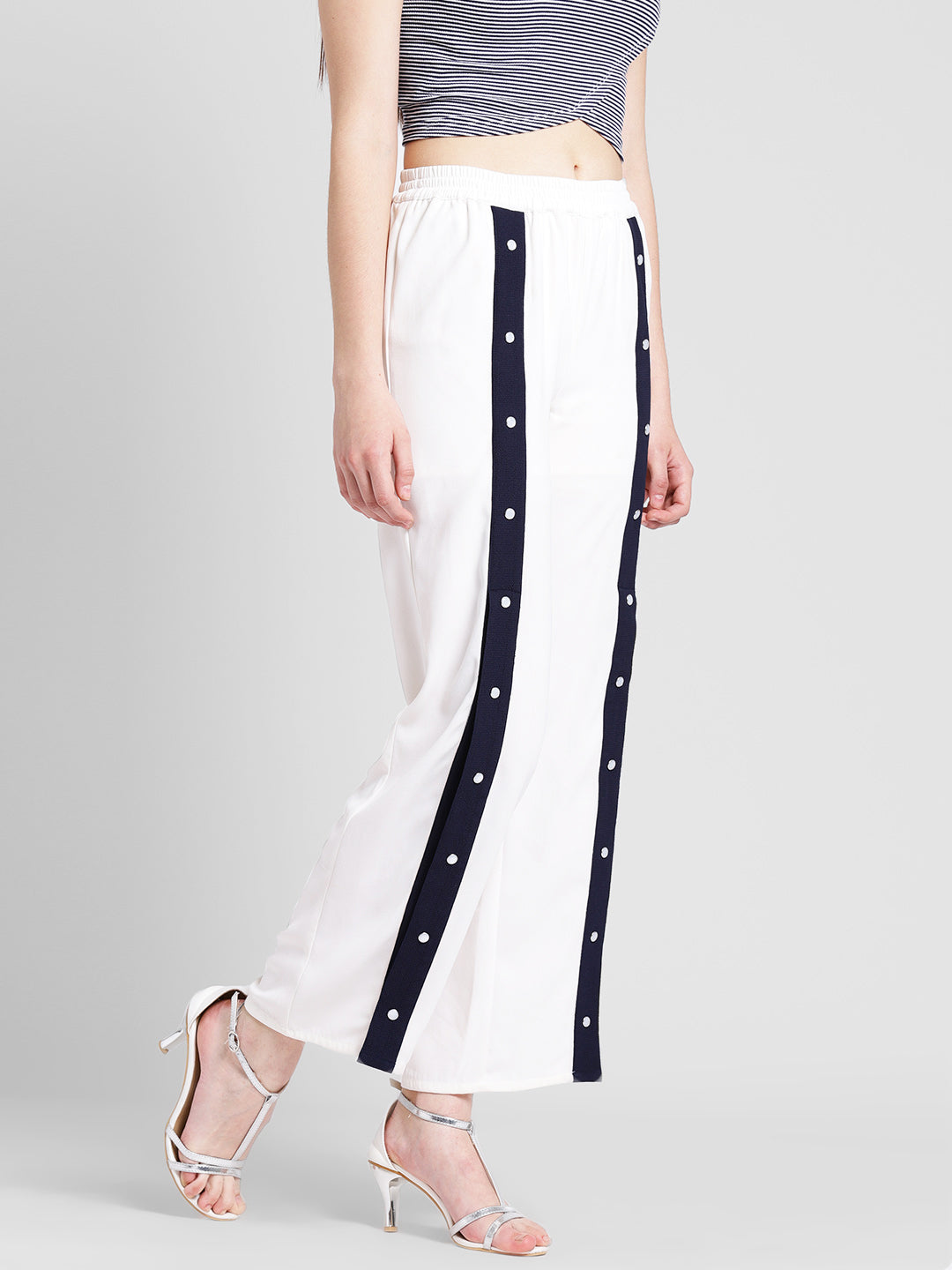 Women's White Track Style Pants with Navy Blue Side Button Detail – Casual Sporty Look